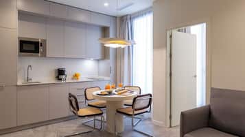 Apartment, 2 Bedrooms | Private kitchen | Fridge, microwave, coffee/tea maker, toaster