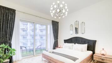 Comfort Apartment, City View | 1 bedroom, in-room safe, blackout drapes, iron/ironing board
