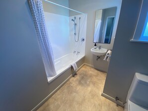 Hair dryer, towels, soap, shampoo
