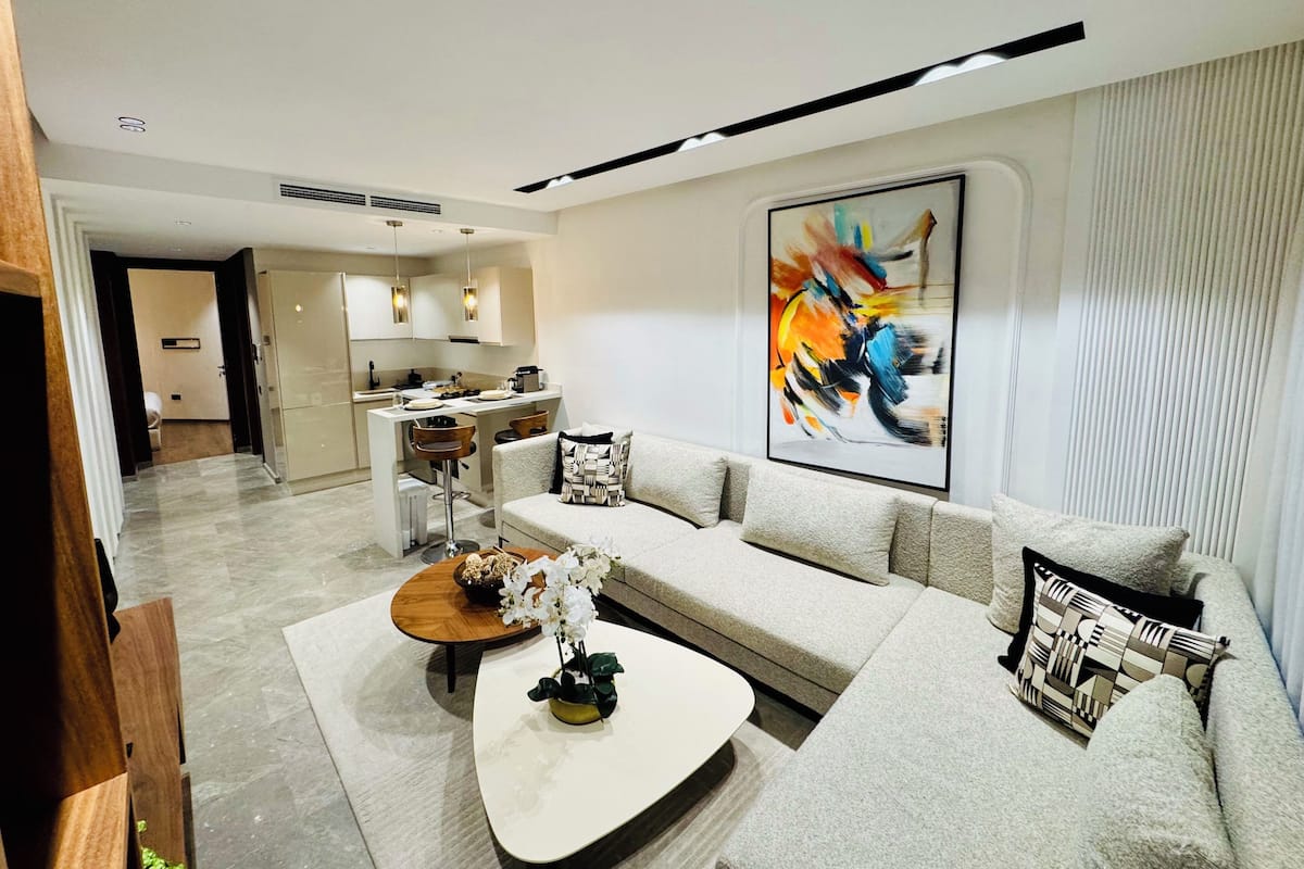 Appartamento Elite | Area soggiorno | Smart TV 50 pollici con canali satellitari, Netflix