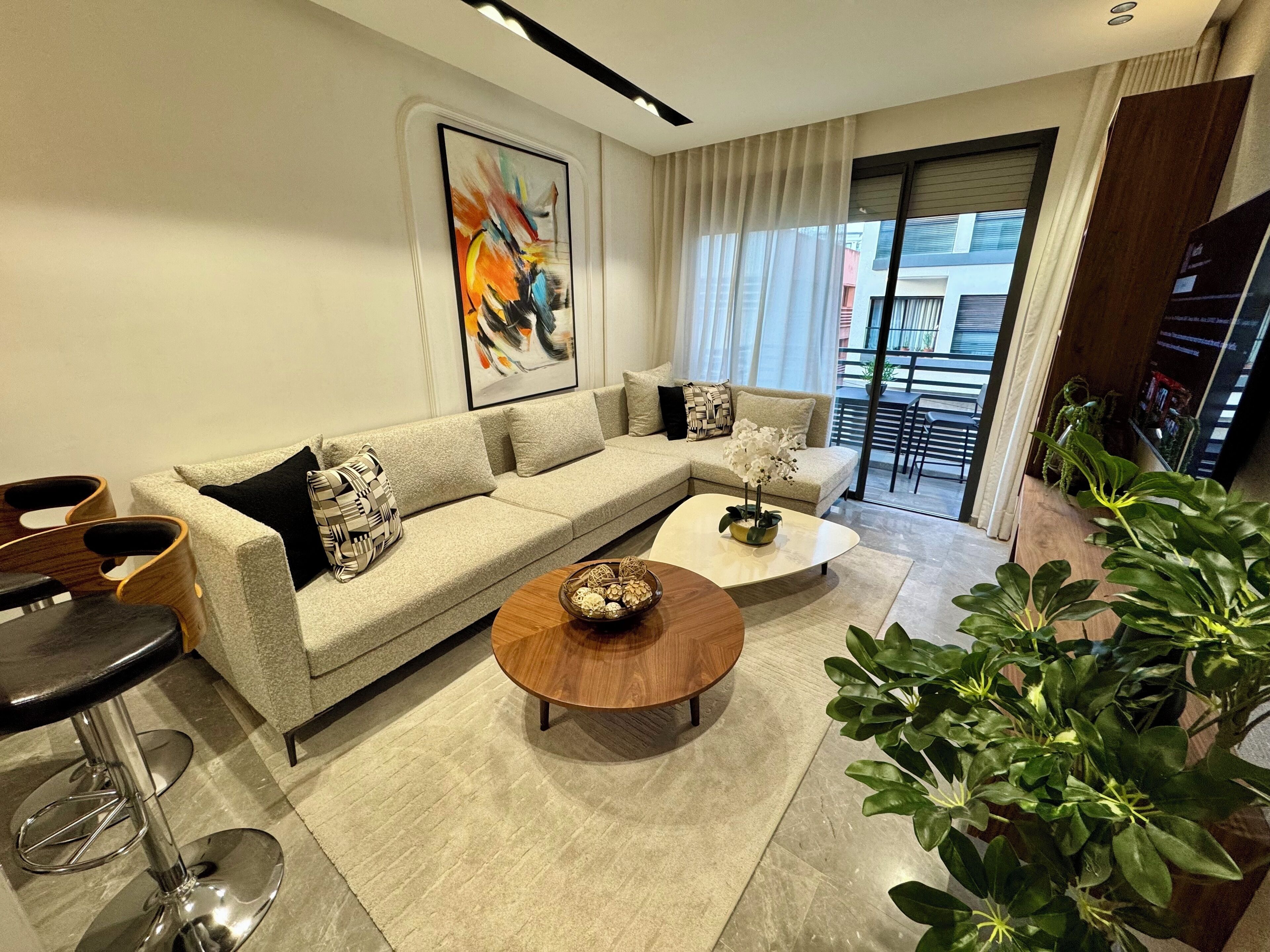 Elite Apartment | Living area | 50-inch Smart TV with satellite channels, Netflix, streaming services