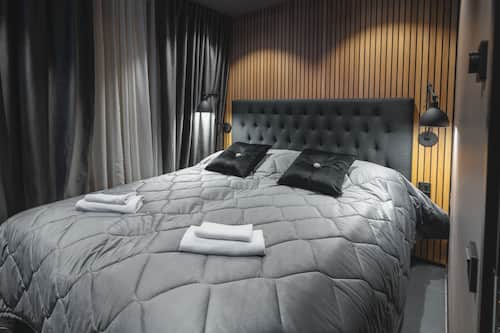 Apartamento de lujo, 2 habitaciones, no fumadores, vistas a la ciudad | Cortinas opacas y sistema de insonorización