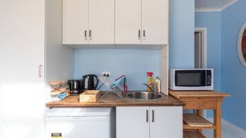 Fridge, microwave, electric kettle, toaster