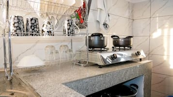Elite Apartment, City View | Private kitchen | Fridge, microwave, cookware/dishes/utensils, dining tables