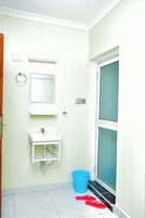 Shower, slippers, towels, soap