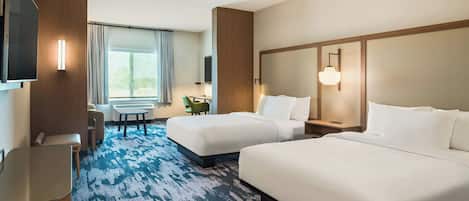 A hotel room with two beds, a desk, a chair, a TV, and a large window with curtains.