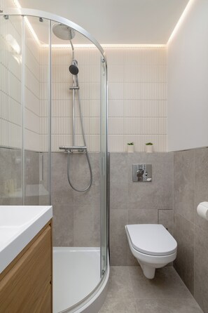 Apartment, 1 Bedroom, Balcony | Bathroom | Shower, rainfall showerhead, free toiletries, towels - Apartment Center of Katowice by Renters (Katowice)