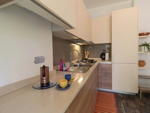 Refrigerador, horno, placa de cocina, lavavajillas