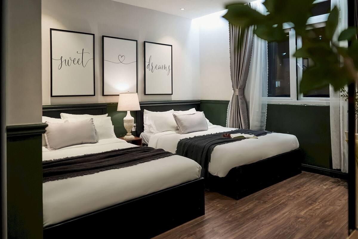Family Quadruple Room, City View | Desk, blackout curtains, iron/ironing board (on request), free WiFi