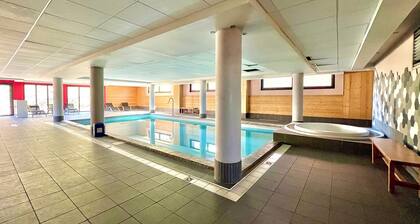 Appart dans rĂ©sidence 4âau pied des pistes - 8 /10 pers - Spa + Piscine + Sauna