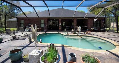 Maxinea's Hideway is a 6 Bedroom ground level home on 3 Acres in Elberta, AL