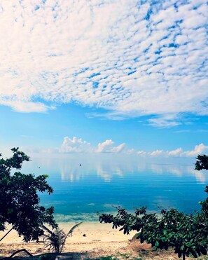 Beach nearby, sun loungers