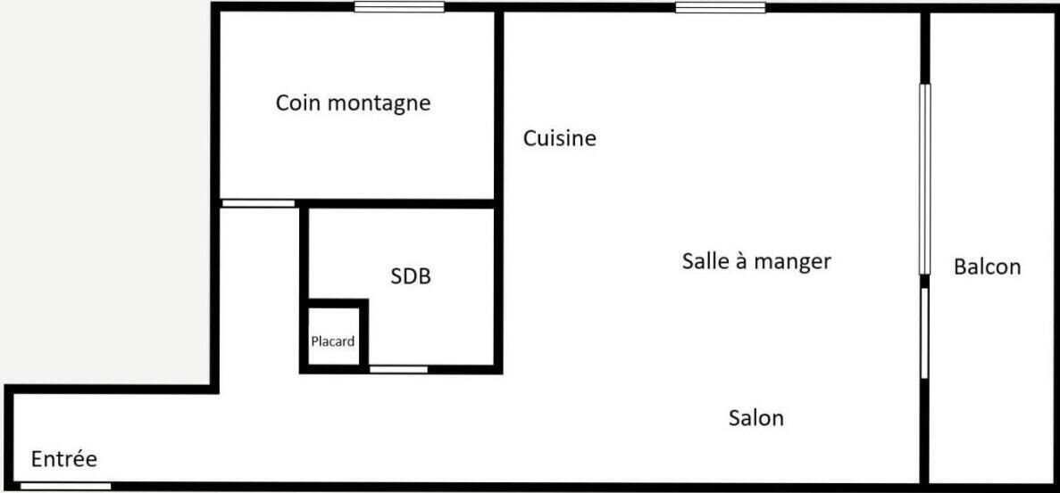 A hotel layout with a coin room, kitchen, dining area, bathroom, and balcony.