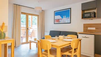 Comfort Apartment, 1 Bedroom | Living area | TV