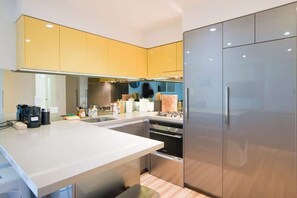 Fridge, microwave, oven, stovetop - Amyra Residences on Rowlands Place - Unit 1506 (Adelaide)