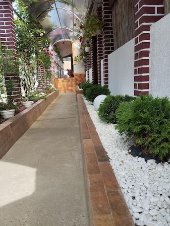 Property grounds. Spacious 7-bedroom house in delightful Велика Бийгань Nagybegany with WiFi, AC