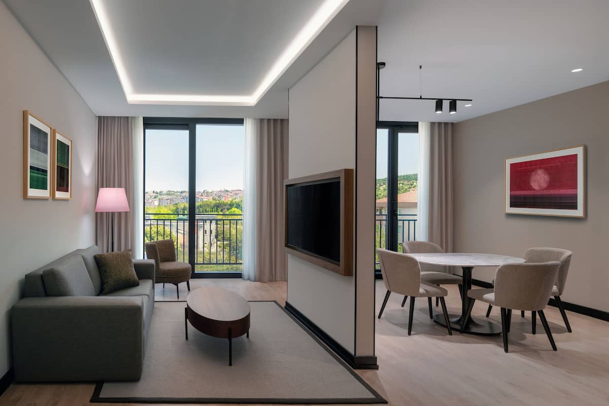 Suite, 1 King Bed with Sofa bed, Kitchen | Minibar, in-room safe, blackout curtains, soundproofing