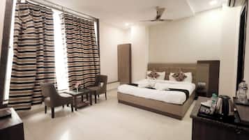 Desk, laptop workspace, free WiFi, bed sheets
