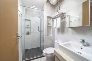 Shower, free toiletries, hair dryer, slippers