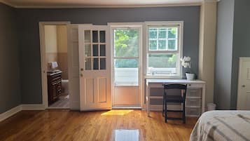 Penthouse Suite At Cozy Homeva | Desk, laptop workspace, blackout curtains, iron/ironing board