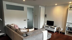 Deluxe-Apartment, Stadtblick | Wohnbereich