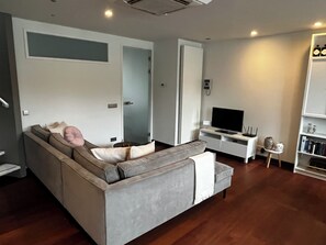 Deluxe appartement, uitzicht op de stad | Woonruimte