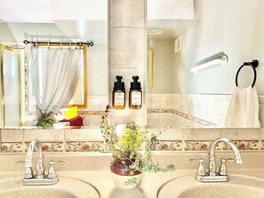 Hair dryer, towels, soap, toilet paper