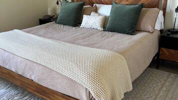 1 bedroom, desk, iron/ironing board, travel crib