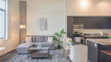 Classic Apartment, 1 Bedroom, Kitchen, Pool View | Living area | 55-inch Smart TV with digital channels