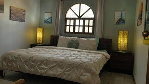 2 dormitorios, caja fuerte, tabla de planchar con plancha