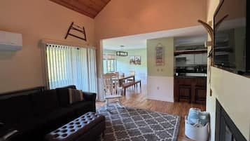 Smart TV, fireplace, foosball, books