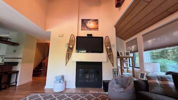 Smart TV, fireplace, foosball, books