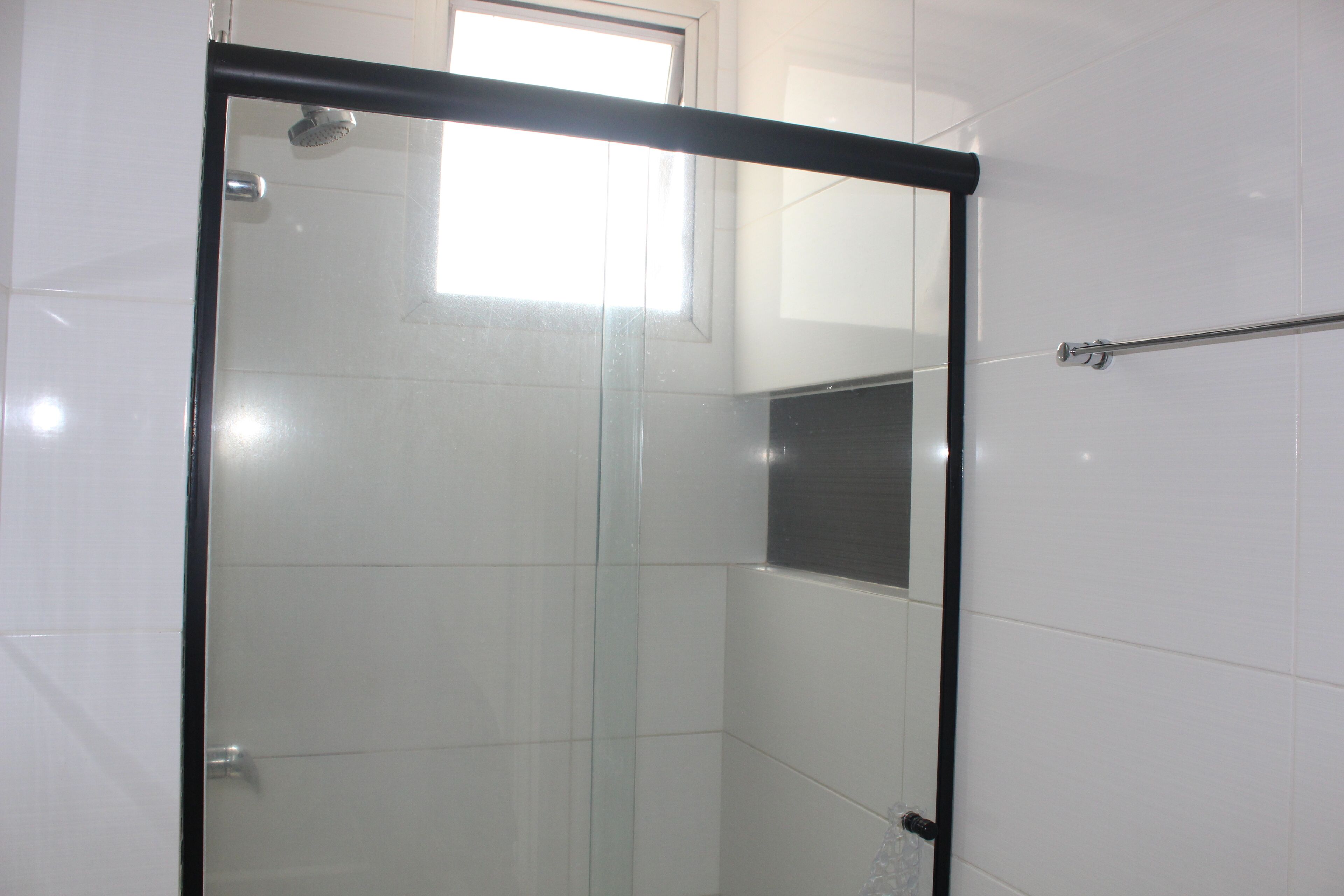 Shower, towels, soap, toilet paper