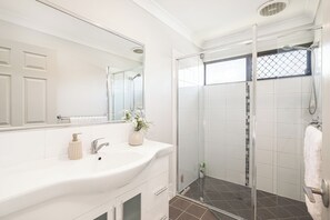 Hair dryer, towels, soap, shampoo