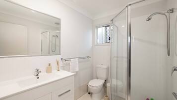 Shower, hair dryer, soap, shampoo
