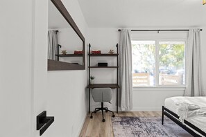 2 bedrooms, desk, iron/ironing board, travel cot