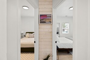 2 bedrooms, desk, iron/ironing board, travel crib