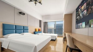 A hotel room with two beds, a desk, and a large window with a city view. - Wuhan Boya Ward Hotel (Optics Valley Convention and Exhibition Center Joy City Branch) (Wuhan)