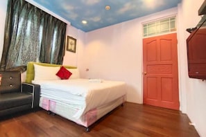 A bedroom with a bed, a sofa, a door, and a window with curtains. - Pure Sky and Cloud Hostel （ID number：112） (Hualien)