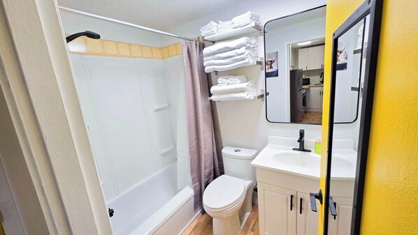 Hair dryer, towels, soap, shampoo