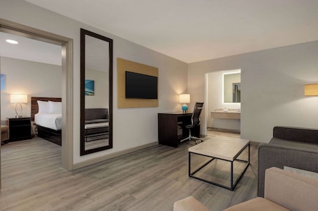 Suite, 1 Bedroom, Non Smoking | Desk, laptop workspace, blackout drapes, iron/ironing board. Baymont By Wyndham Emporia Va