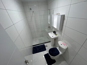 Hair dryer, towels, soap, shampoo