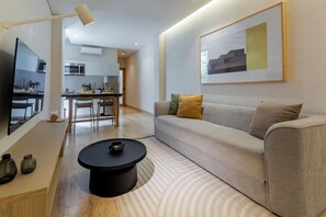 Departamento de lujo | Área de sala de estar | Smart TV de 50 pulgadas con canales digitales 