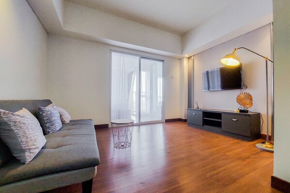 Deluxe Apartment | Living area - Comfy And Minimalist 1Br At Tamansari Bintaro Mansion Apartment (South Tangerang)