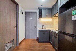 Deluxe Apartment | Private kitchen - Comfy And Minimalist 1Br At Tamansari Bintaro Mansion Apartment (South Tangerang)