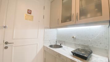 Estudio | Cocina privada | Frigobar, parrilla de estufa, arrocera y comedor