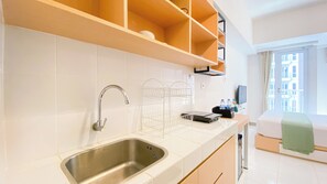 Estudio | Cocina privada | Frigobar, parrilla de estufa y arrocera 