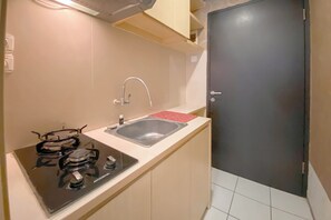 Private kitchen - Stylish Studio Apartment At Grand Asia Afrika (Bandung)