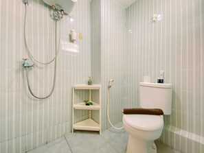 Shower, towels - Cozy And Simply Look Studio Cinere Resort Apartment (Depok)
