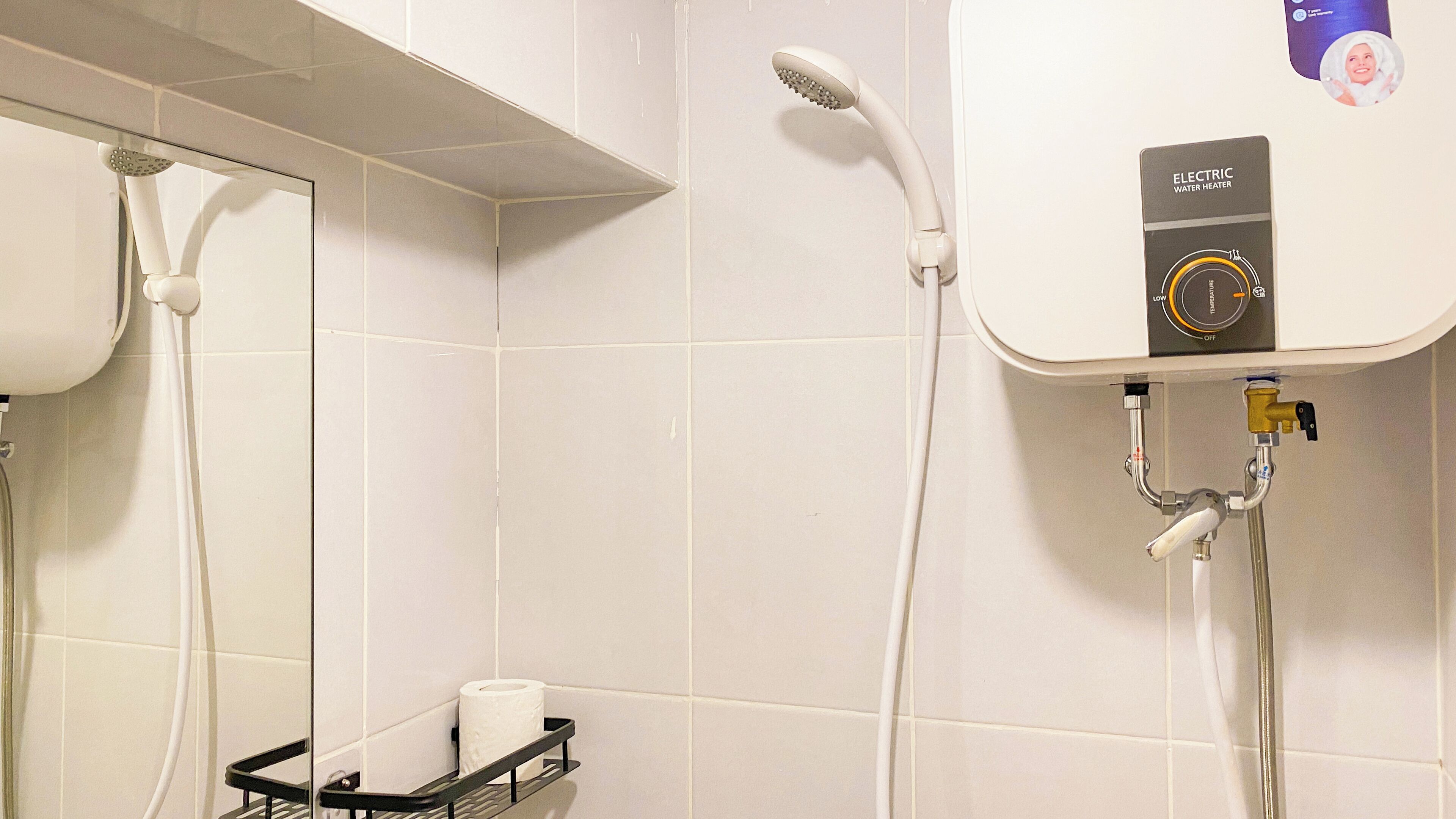 Estudio | Baño | Regadera y toallas 